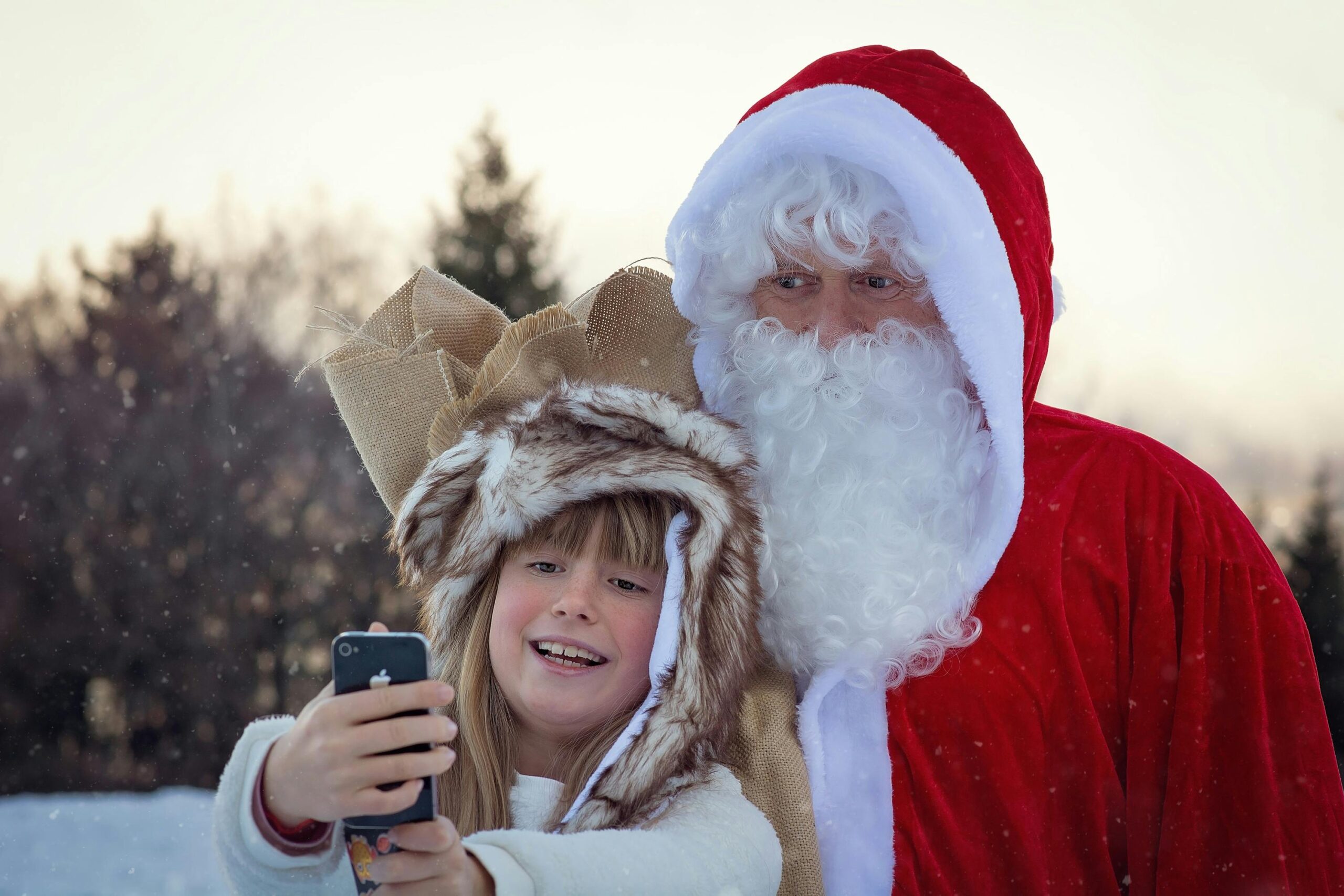 Santa and a child taking selfie